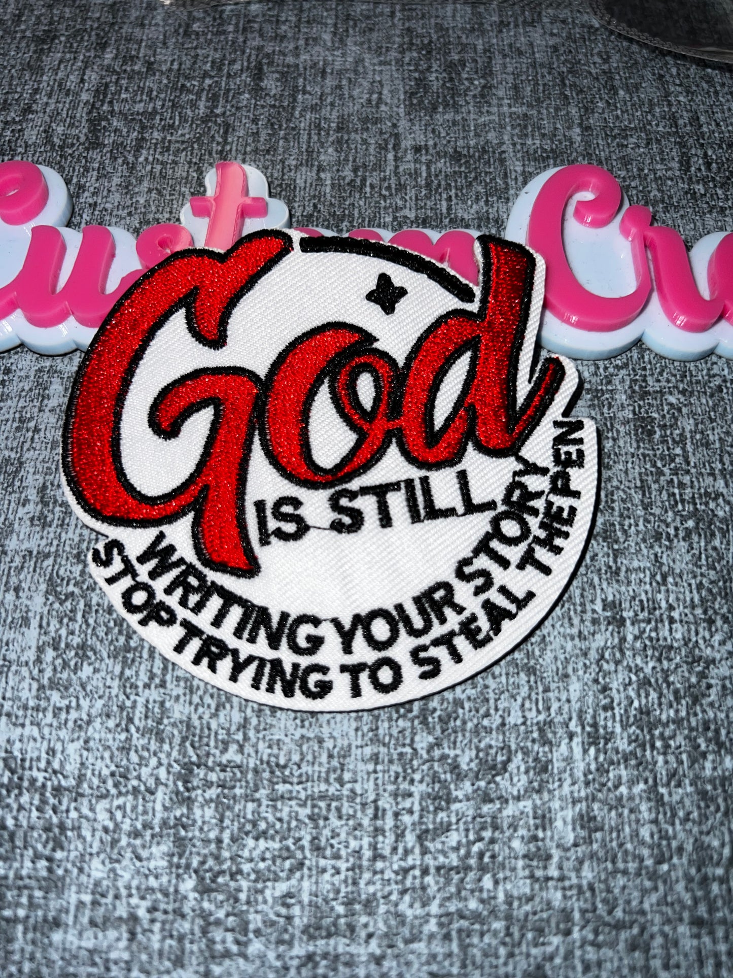 Faith Statement Iron-On Patch – “God Is Still Writing Your Story” Embroidered Patch