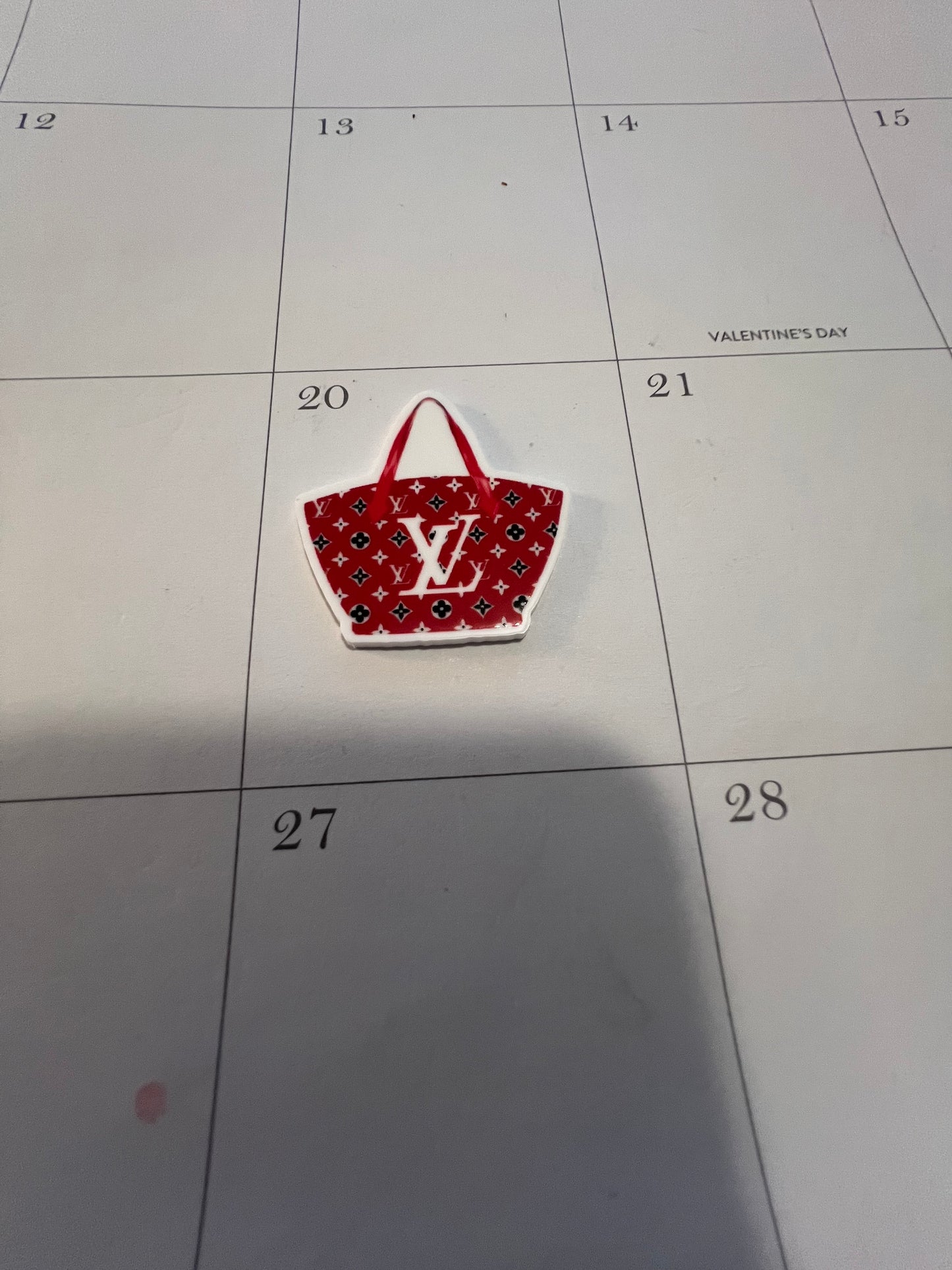 Red LV purse