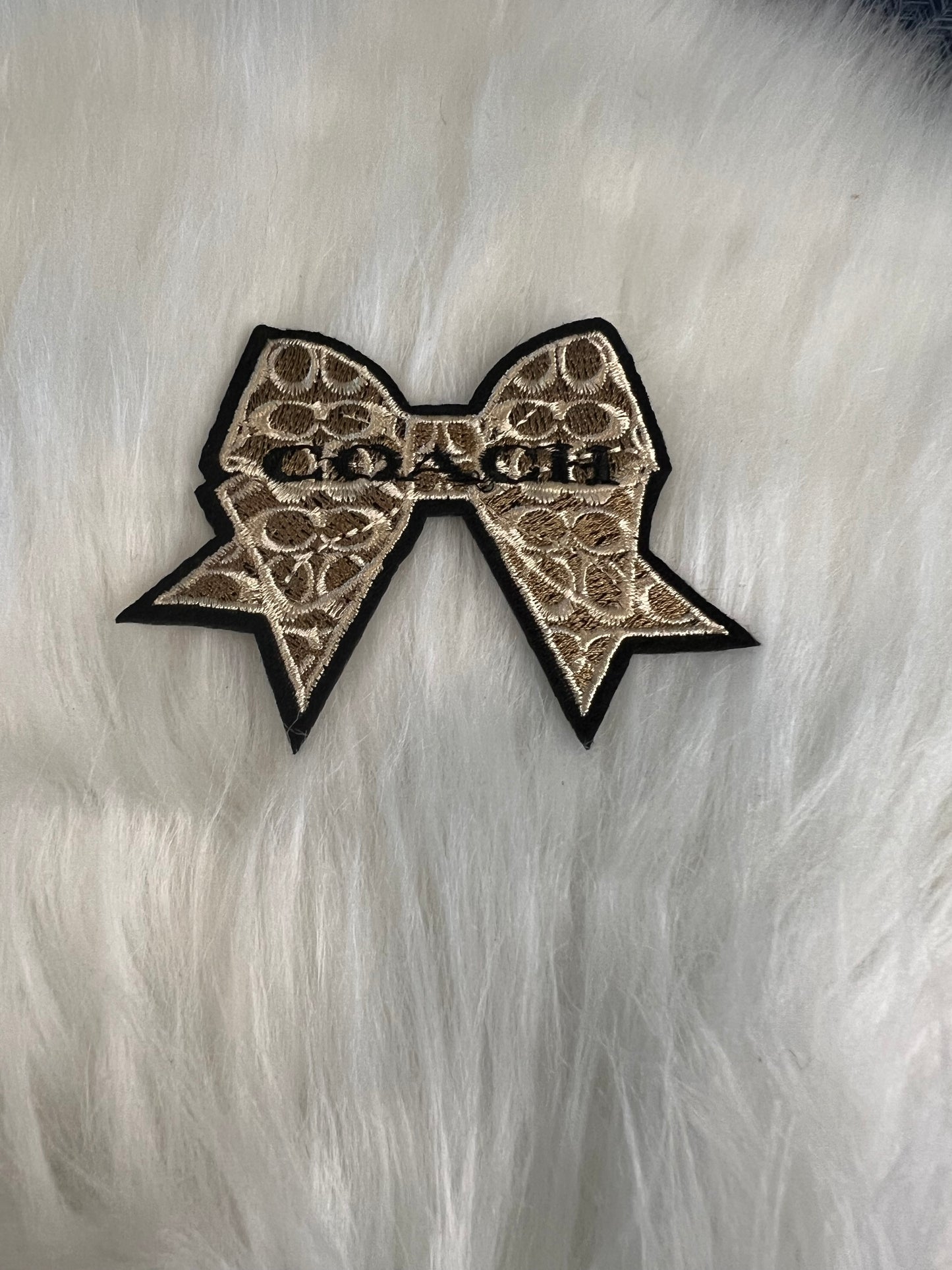 Tan Black Coach Bow