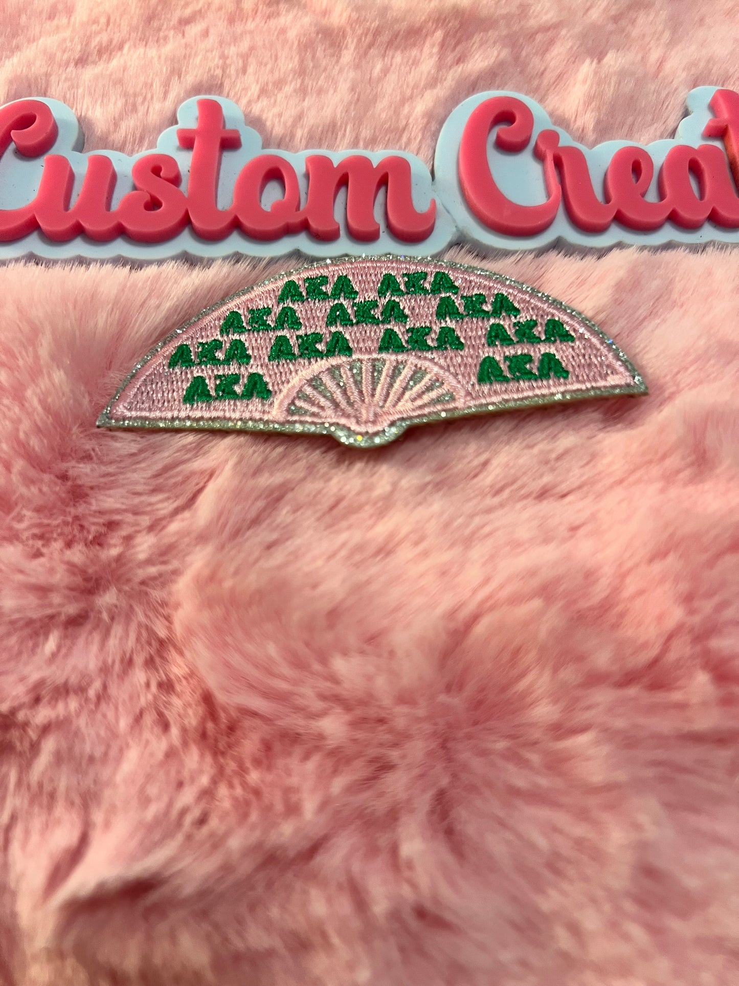 Glitter AKA green letters fan