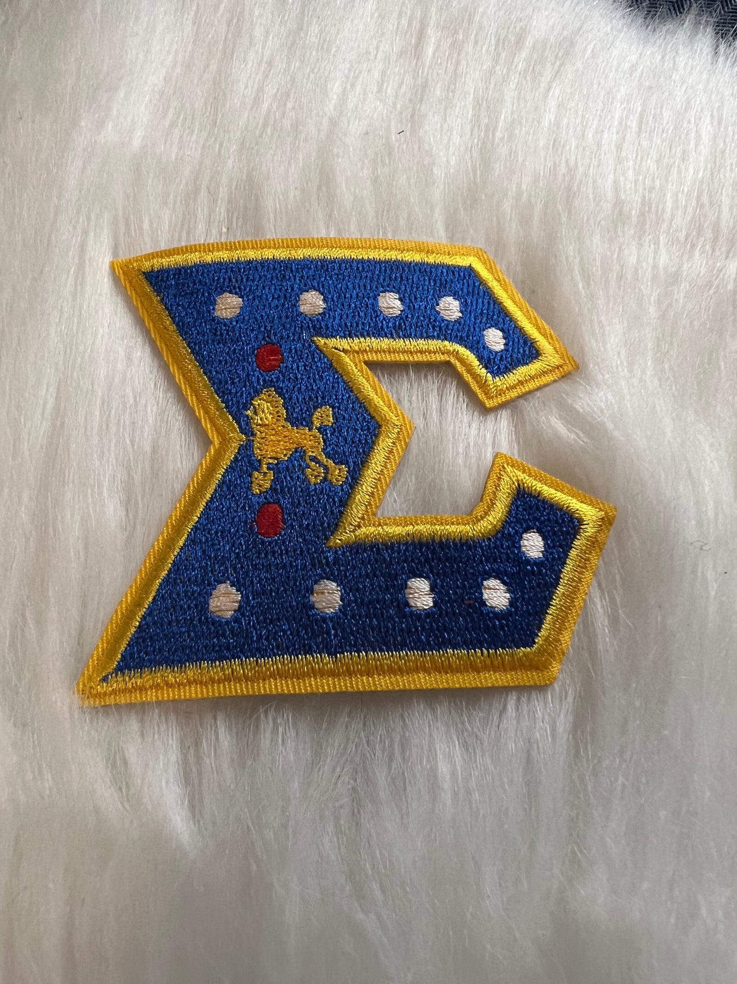 Yellow Sigma Greek Letter