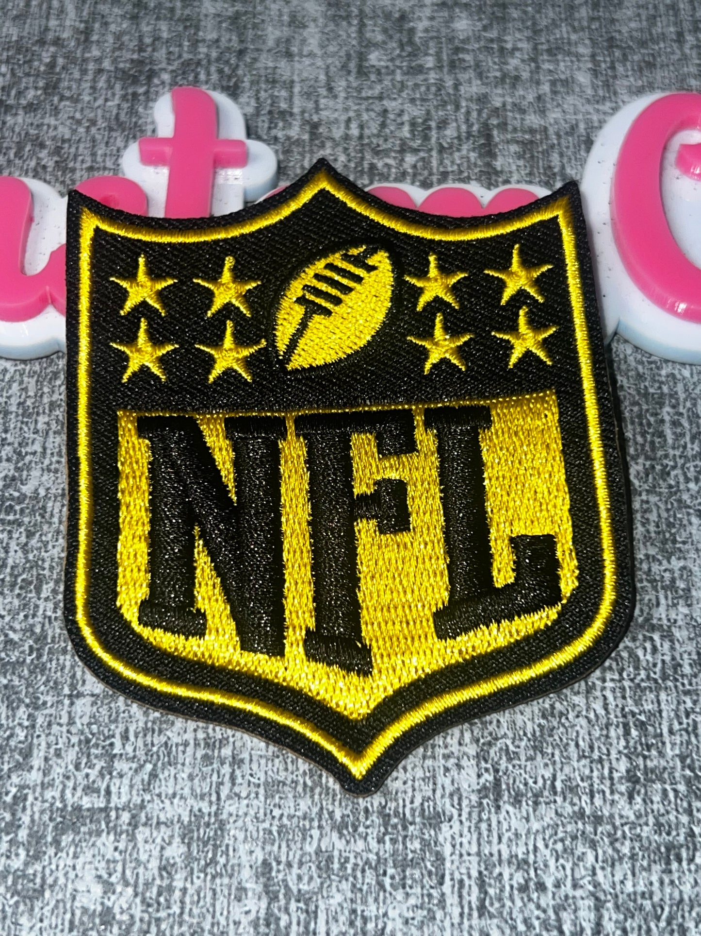 Yellow and Black Shield Embroidered Iron-On Patch | Sports Logo Applique for Clothing and Bags