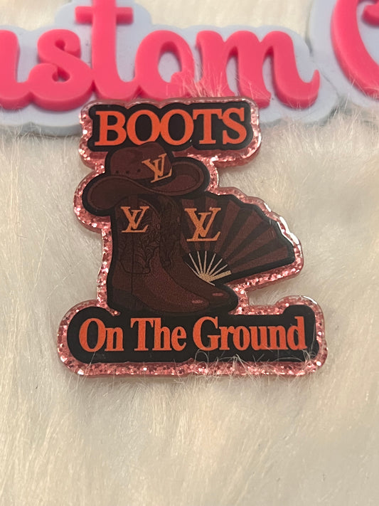 Brown LV Boots on Ground