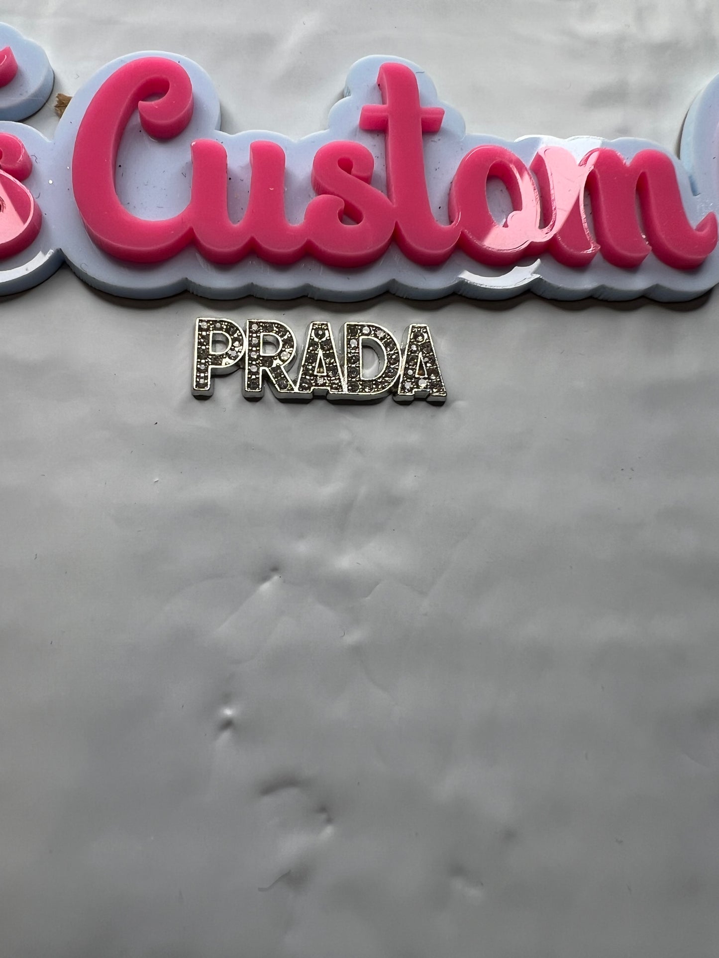 Silver Prada Bling word