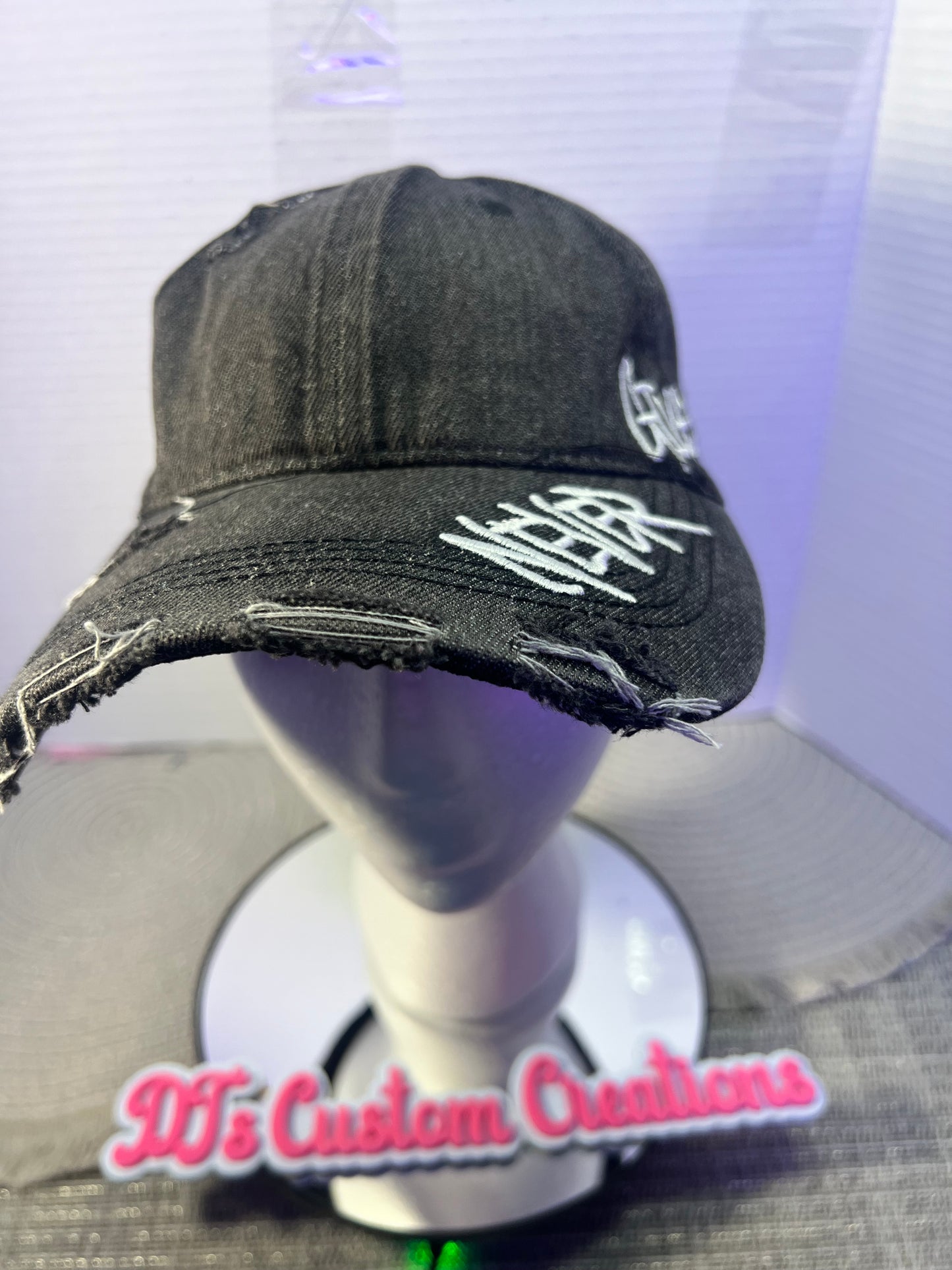“Never Give Up” Black Distressed Hat”