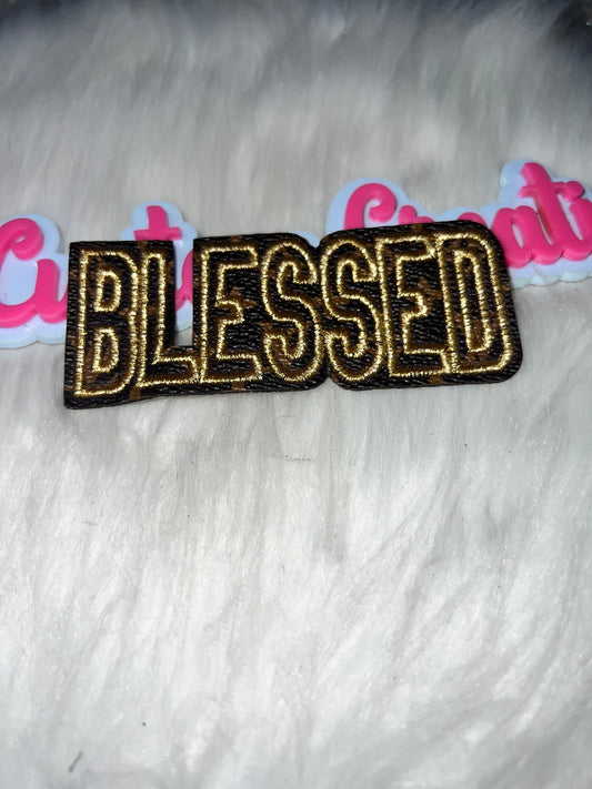 “Blessed” LV Letter Patch – Gold & Black