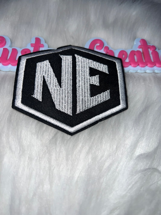 NE Logo Patch – Black & White Iron-On Patch