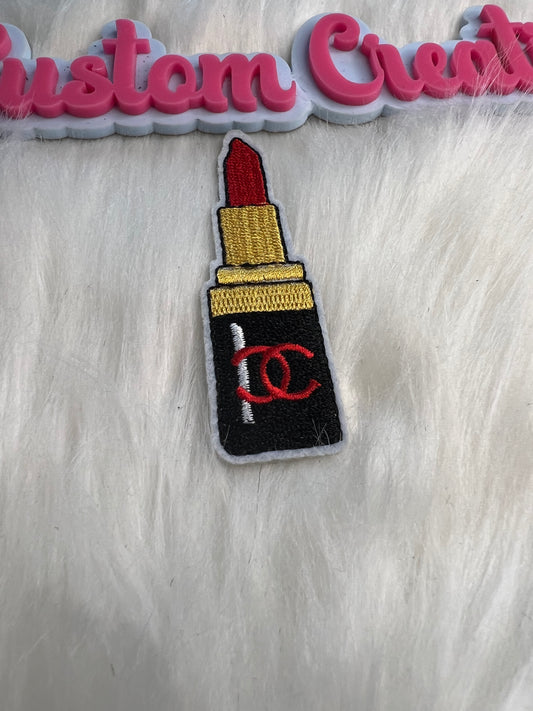 Red Gold Black CC lipstick