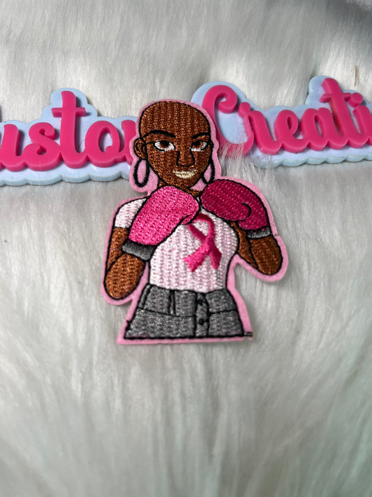 Bald survivors boxing gloves lady