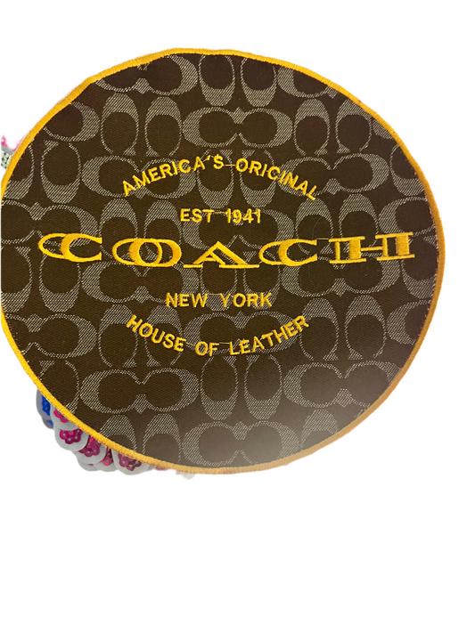 Round Tan & Gold Coach
