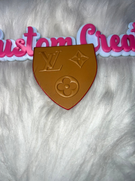 Tan Embossed Shield Fashion Patch