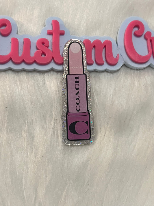 Purple Coach lipstick
