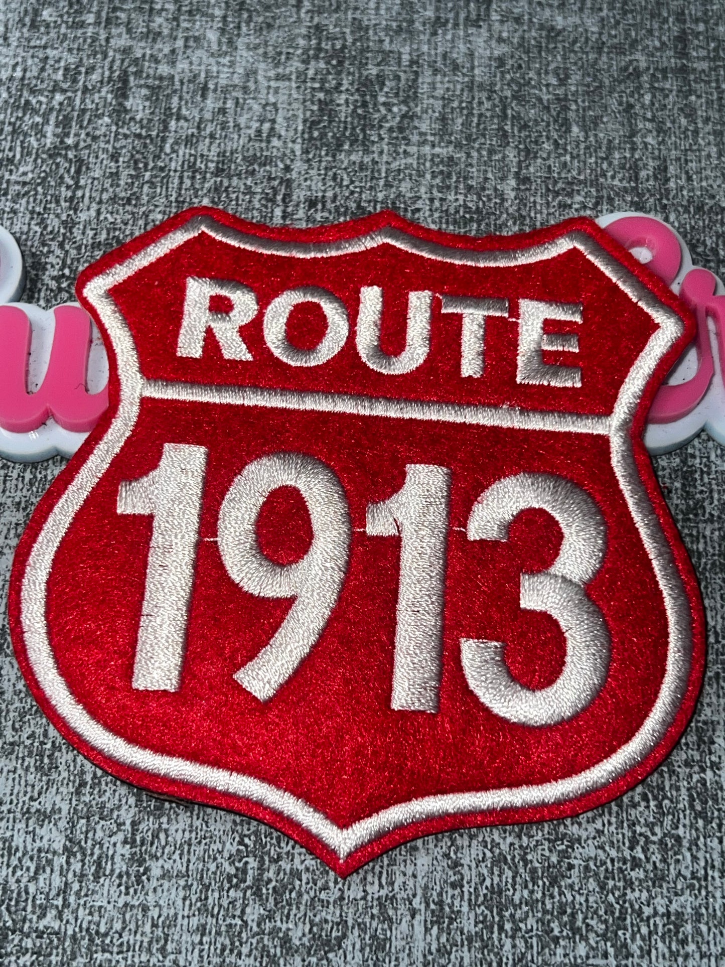 Red White Route 1913 Embroidered Iron-On Patch | Shield Shape Statement Applique for Jackets and Bags Delta colors