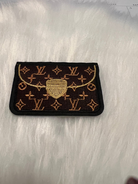 Brown LV clutch