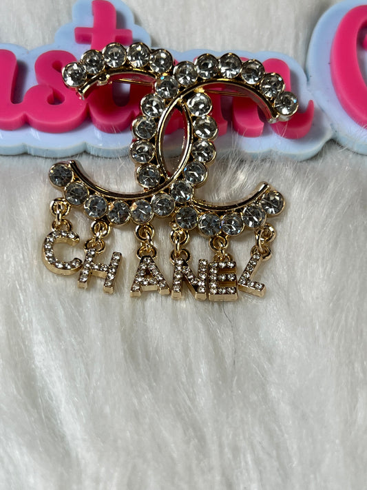 Gold Bling CC brooch w/word