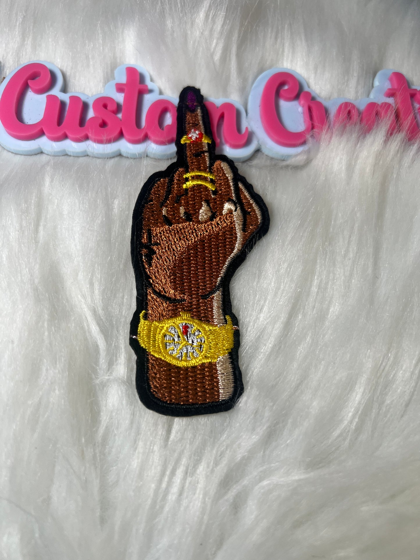 Middle Finger with Gold Watch