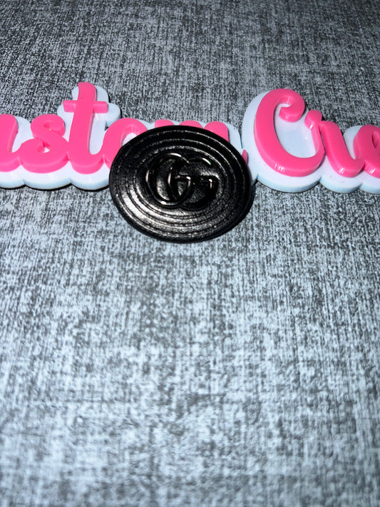 Black Oval Embossed Tag