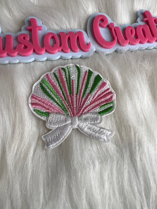 Aka color shell with bow