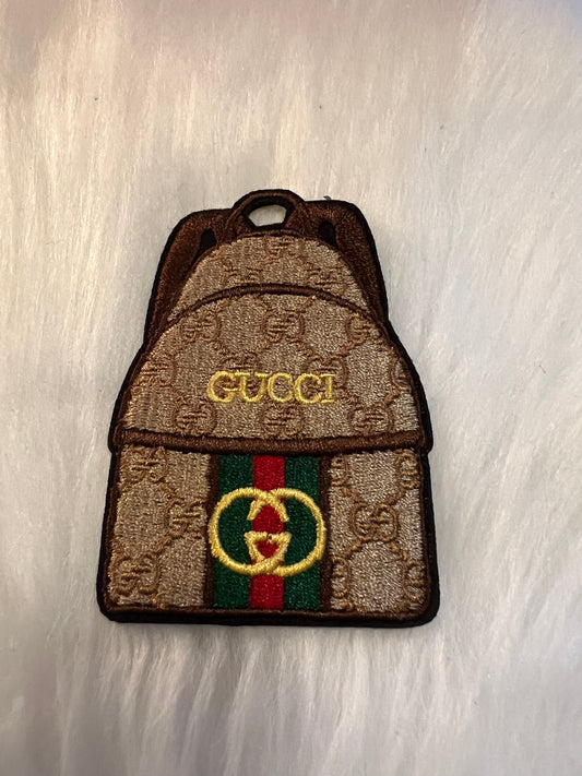 GG tan backpack