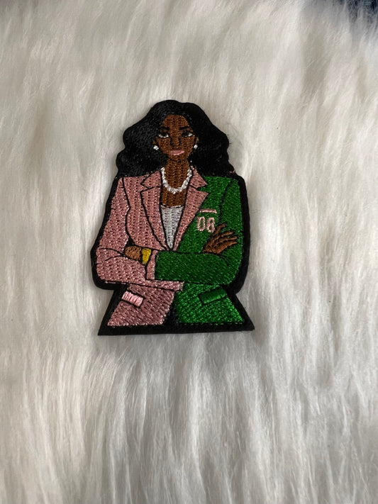 Lady AKA in suit