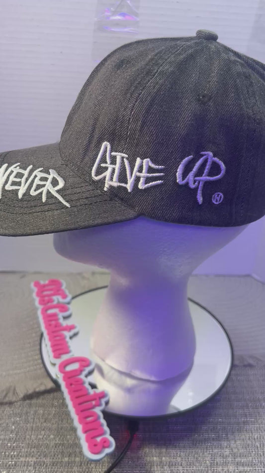 “Never Give Up” Black Distressed Hat”
